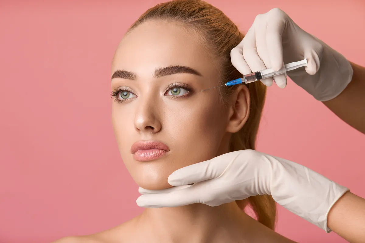 Needling being injected into a Woman's face during an Ottawa Cosmetic Injection service